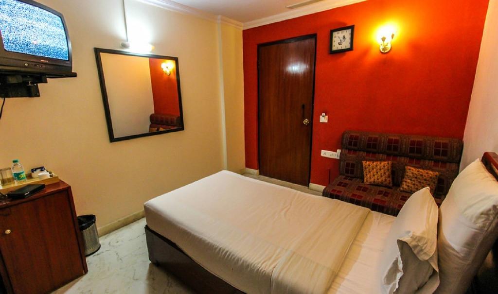 Hotel Pigeon International Bangalore Zimmer foto