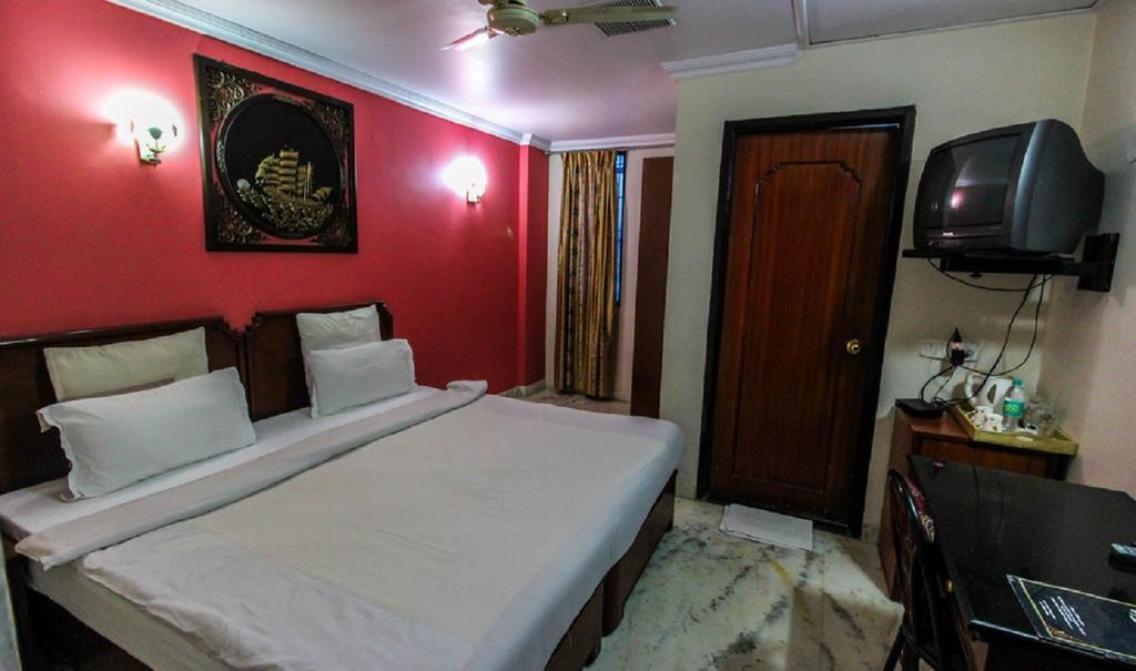 Hotel Pigeon International Bangalore Zimmer foto