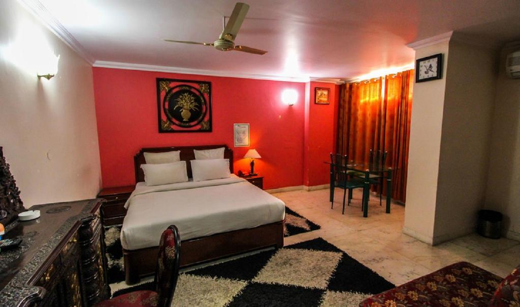 Hotel Pigeon International Bangalore Zimmer foto